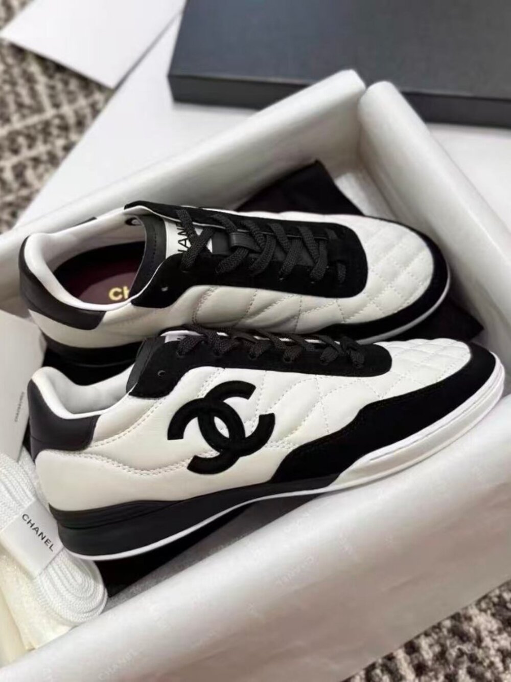 Chanel Black & White Quilted CC Logo Low Top Sneakers
